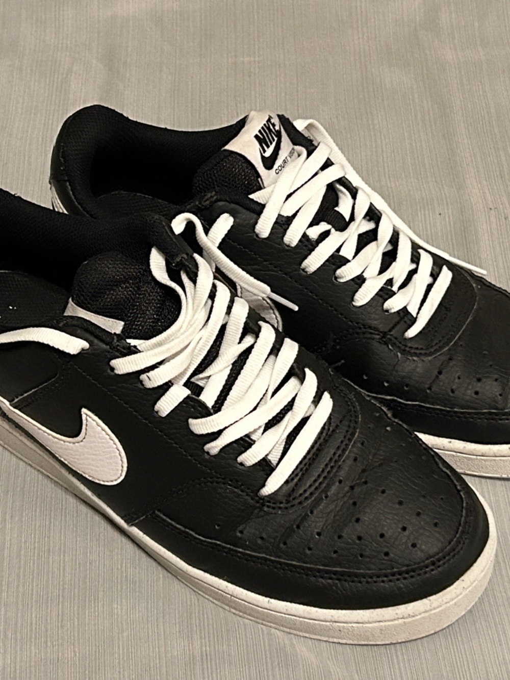 Nike Court Vision Black and White Low-Top Leather Sneakers